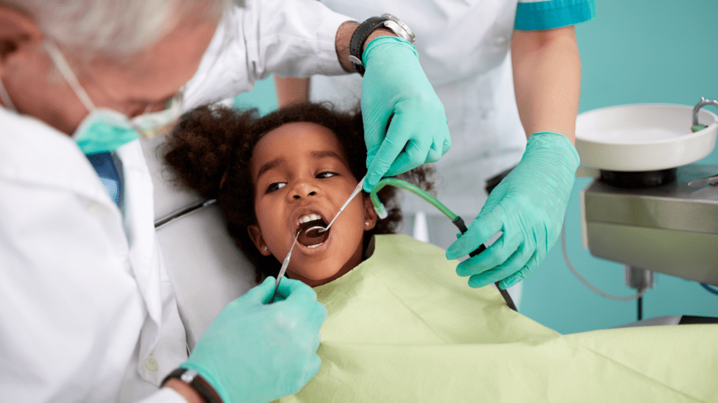 Young girl receiving dental exam